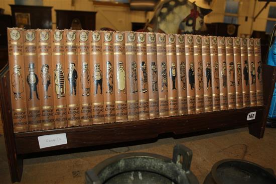 25 vols of Punch in a bookshelf